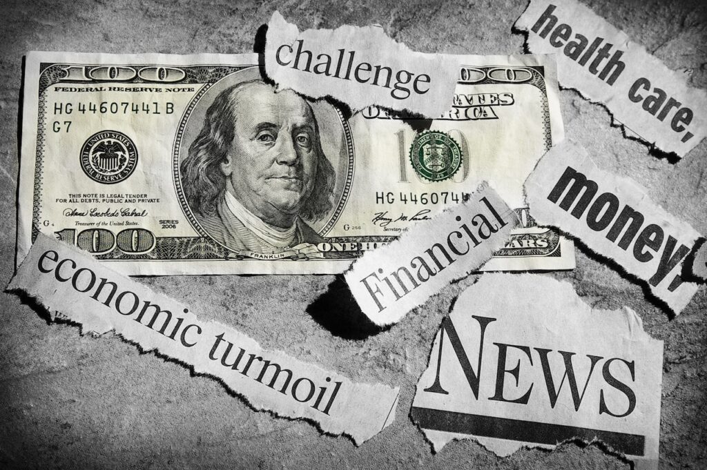 newspaper headlines showing news, and money